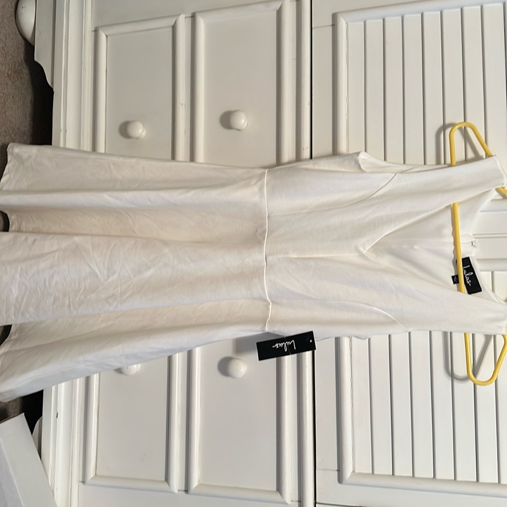 Never worn. Lulu’s white dress. About knee length. Size small.